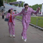 
              Royal fans arrives near Buckingham Palace, London, Saturday June 4, 2022 ahead of the Platinum Jubilee concert, on the third of four days of celebrations to mark the Platinum Jubilee. The events over a long holiday weekend in the U.K. are meant to celebrate the monarch's 70 years of service. (AP Photo/Frank Augstein)
            