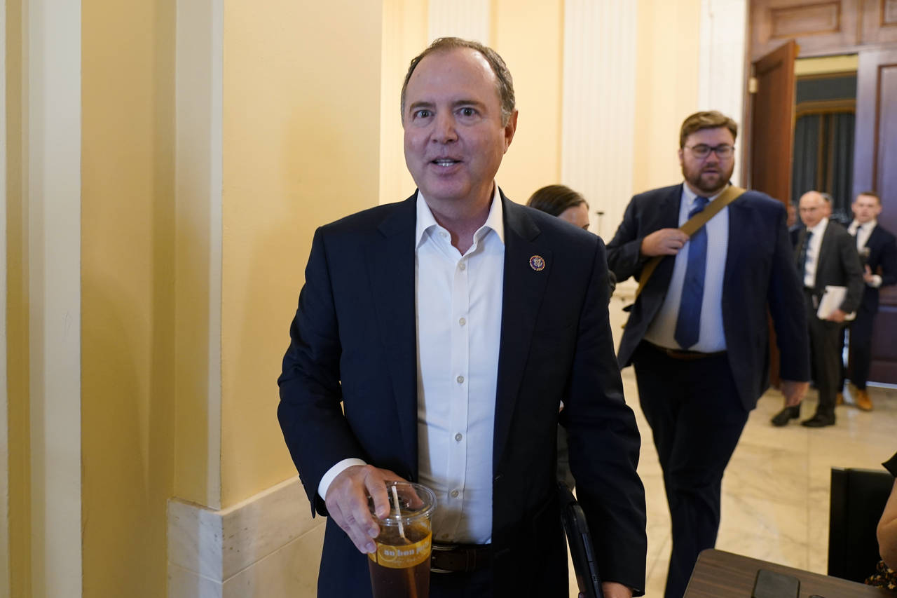 Rep. Adam Schiff, D-Calif., leaves the hearing room after preparing for today's hearing, as the Hou...