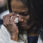 
              Serena Liebengood, widow of Capitol Police officer Howie Liebengood, cries as a video of the Jan. 6 attack on the U.S. Capitol is played during a public hearing of the House select committee investigating the attack is held on Capitol Hill, Thursday, June 9, 2022, in Washington. (AP Photo/Andrew Harnik)
            