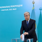 
              In this photo released by Kazakhstan's Presidential Press Service, Kazakhstan's President Kassym-Jomart Tokayev cast his ballot at a polling station in the Al-Farabi Schoolchildren Palace during the Nationwide Referendum in Nur-Sultan, Kazakhstan, Sunday, June 5, 2022. Kazakhs vote on a package of reforms intended to transform the country from a super-presidential system to a "presidential system with a strong parliament." (Kazakhstan's Presidential Press Service via AP)
            