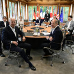 
              Clockwise from left, British Prime Minister Boris Johnson,  Japanese Prime Minister Fumio Kishida, the President of the European Commission Ursula von der Leyen, European Council President Charles Michel, Italian Prime Minister Mario Draghi, Canadian Prime Minister Justin Trudeau, French President Emmanuel Macron, German Chancellor Olaf Scholz and U.S. President Joe Biden attend a working session during of the G7 leaders summit at Castle Elmau in Kruen, near Garmisch-Partenkirchen, Germany, on Tuesday, June 28, 2022. The Group of Seven leading economic powers are meeting in Germany for their annual gathering Sunday through Tuesday. (John MacDougall/Pool Photo via AP)
            