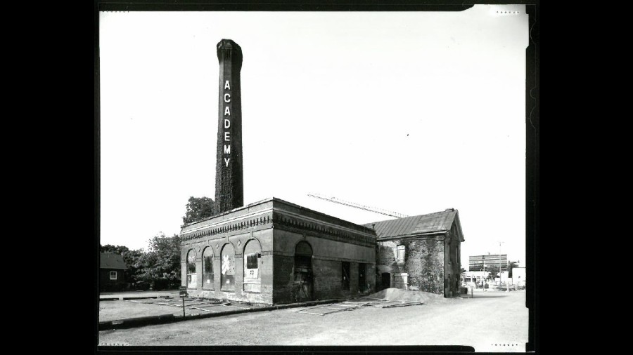Historic American Buildings Survey photo of the smokestack and boiler/laundry building at Providenc...
