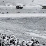 An estimated 8,000 people watched "Operation Seafair" from bleachers set up near the beach, and perhaps an additional 7,000 looked on from outside the base. (US Navy)