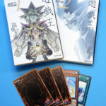 
              This photo shows “Yu-Gi-Oh!” manga comic and trading cards in Tokyo Thursday, July 7, 2022. Kazuki Takahashi, the creator of the “Yu-Gi-Oh!” manga comic and trading card game, has died, apparently while snorkeling in southwestern Japan, the coast guard said Friday, July 8, 2022. (Shohei Miyano/Kyodo News via AP)
            