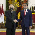 
              East Timor President Jose Ramos-Horta, left, shake hands with Indonesian President Joko Widodo during their meeting at the Presidential Palace in Bogor, West Java, Indonesia, Tuesday, July 19, 2022. (AP Photo/Achmad Ibrahim)
            