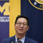 
              Santa Ono addresses the media after being introduced as the new president of the University of Michigan, Wednesday, July 13, 2022, in Ann Arbor, Mich. Ono becomes UM's 15th president and its first minority and Asian chief executive — the son of Japanese immigrants who came to the United States after World War II. The 59-year-old Ono has led the University of British Columbia for nearly six years after guiding the University of Cincinnati for four years. (AP Photo/Carlos Osorio)
            
