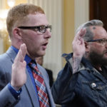 
              Stephen Ayres, who pleaded guilty in June 2022 to disorderly and disruptive conduct in a restricted building, left, and Jason Van Tatenhove, an ally of Oath Keepers leader Stewart Rhodes, right, are sworn in to testify as the House select committee investigating the Jan. 6 attack on the U.S. Capitol holds a hearing at the Capitol in Washington, Tuesday, July 12, 2022. (AP Photo/J. Scott Applewhite)
            