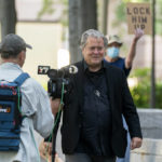 
              Former White House strategist Steve Bannon arrives at federal court in Washington, Wednesday, July 20, 2022. Bannon was brought to trial on a pair of federal charges for criminal contempt of Congress after refusing to cooperate with the House committee investigating the U.S. Capitol insurrection on Jan. 6, 2021. (AP Photo/Manuel Balce Ceneta)
            