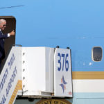 
              U.S. President Joe Biden gestures before his departure to Saudi Arabia from Ben Gurion airport in Lod near Tel Aviv, Israel Friday, July 15, 2022. (Abir Sultan/Pool Photo via AP)
            