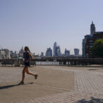 
              A man runs on the south bank of river Thames, in London, Monday, July 18, 2022. Britain’s first-ever extreme heat warning is in effect for large parts of England as hot, dry weather that has scorched mainland Europe for the past week moves north, disrupting travel, health care and schools. (AP Photo/Alberto Pezzali)
            