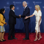 
              FILE -  Peru's President Pedro Castillo and his wife Lilia Paredes, left, greet President Joe Biden and first lady Jill Biden during the Summit of the Americas, June 8, 2022, in Los Angeles. After a year in office, Castillo has seen his poll number fall as his administration has been beset by a myriad of troubles, ranging from accusations of corruption to having parliament attempt to remove him twice from office. (AP Photo/Evan Vucci, File)
            