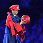 
              FILE - Then Japanese Prime Minister Shinzo Abe appears as the Nintendo game character Super Mario during the closing ceremony at the 2016 Summer Olympics in Rio de Janeiro, Brazil on Aug. 21, 2016. Former Japanese Prime Minister Abe, a divisive arch-conservative and one of his nation's most powerful and influential figures, has died after being shot during a campaign speech Friday, July 8, 2022, in western Japan, hospital officials said. (Yu Nakajima/Kyodo News via AP, File)
            