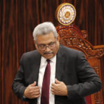
              FILE - Sri Lankan President Gotabaya Rajapaksa leaves after addressing parliament during the ceremonial inauguration of the session, in Colombo, Sri Lanka on Jan. 3, 2020. The president of Sri Lanka fled the country early Wednesday, July 13, 2022, days after protesters stormed his home and office and the official residence of his prime minister amid a three-month economic crisis that triggered severe shortages of food and fuel.(AP Photo/Eranga Jayawardena, File)
            
