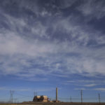 
              A smokestack stands at a coal plant on Wednesday, June 22, 2022, in Delta, Utah. Developers in rural Utah who want to create big underground caverns to store hydrogen fuel won a $504 million loan guarantee this spring. They plan to convert the site of the 40-year-old coal power plant to cleanly-made hydrogen by 2045. (AP Photo/Rick Bowmer)
            