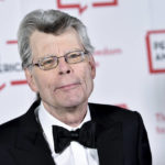 
              FILE - Stephen King poses for a photo May 22, 2018, at the 2018 PEN Literary Gala in New York. The government and publishing titan Penguin Random House are set to exchange opening salvos in a federal antitrust trial Monday, Aug. 1, 2022, as the U.S. seeks to block the biggest U.S. book publisher from absorbing rival Simon & Schuster. The government’s “star” witness will be Stephen King, the renowned and genre-transcending author whose works are published by Simon & Schuster. (Photo by Evan Agostini/Invision/AP, File)
            