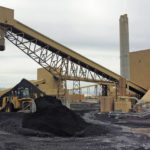 
              Piles of coal wait to be burned outside Intermountain Power Plant on Wednesday, June 22, 2022, in Delta, Utah. Developers in rural Utah who want to create big underground caverns to store hydrogen fuel won a $504 million loan guarantee this spring. They plan to convert the site of the 40-year-old coal power plant to cleanly-made hydrogen by 2045. (AP Photo/Rick Bowmer)
            