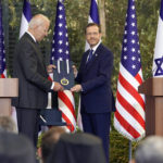 
              President Joe Biden receives the Israeli Presidential Medal of Honor from Israeli President Isaac Herzog, Thursday, July 14, 2022, in Jerusalem. (AP Photo/Evan Vucci)
            