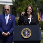 
              Vice President Kamala Harris speaks as President Joe Biden looks on, during an event to celebrate the passage of the "Bipartisan Safer Communities Act," a law meant to reduce gun violence, on the South Lawn of the White House, Monday, July 11, 2022, in Washington. (AP Photo/Evan Vucci)
            