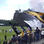 
              Fans wave team banners during a presentation of Brazilian Dani Alves, a new member of the Pumas UNAM soccer club, at the Pumas training facility in Mexico City, Saturday, July 23, 2022. (AP Photo/Marco Ugarte)
            