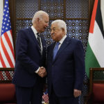
              Palestinian President Mahmoud Abbas and U.S. President Joe Biden shake hands in the West Bank town of Bethlehem, Friday, July 15, 2022. (AP Photo/Evan Vucci)
            
