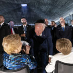 
              President Joe Biden talks with American Holocaust survivors Dr. Gita Cycowicz and Rena Quint in the Hall of Remembrance at Yad Vashem, Wednesday, July 13, 2022, in Jerusalem. (AP Photo/Evan Vucci)
            