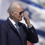 
              President Joe Biden adjusts his glasses during a welcoming ceremony upon his arrival at Ben Gurion International Airport near Tel Aviv, Israel Wednesday, July 13, 2022. Biden arrives in Israel on Wednesday for a three-day visit, his first as president. He will meet Israeli and Palestinian leaders before continuing on to Saudi Arabia. (AP Photo/Ariel Schalit)
            