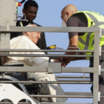 
              Pope Francis arrives at Rome's Leonardo da Vinci International airport Sunday, July 24, 2022, to board his flight to Edmonton, Canada, where he will start a six-day pastoral visit to the country. Pope Francis begins a weeklong trip to Canada on Sunday to apologize to Indigenous peoples for the abuses committed by Catholic missionaries in the country's notorious residential schools. (AP Photo/Riccardo de Luca)
            