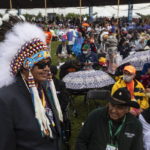 
              Indigenous people gather to see Pope Francis on his visit to Maskwacis, Alberta during his papal visit across Canada on Monday, July 25, 2022. (Jason Franson./The Canadian Press via AP)
            