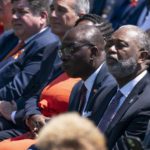 
              Buffalo Mayor Byron Brown listens as President Joe Biden speaks during an event to celebrate the passage of the "Bipartisan Safer Communities Act," a law meant to reduce gun violence, on the South Lawn of the White House, Monday, July 11, 2022, in Washington. (AP Photo/Evan Vucci)
            
