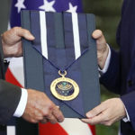 
              President Joe Biden, left, receives the Israeli Presidential Medal of Honor from Israeli President Isaac Herzog, Thursday, July 14, 2022, in Jerusalem. (AP Photo/Evan Vucci)
            
