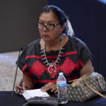 
              FILE— Navajo Presidential candidate Dolly Manson listens during a Presidential Forum at Arizona State University, Tuesday, July 12, 2022, in Phoenix. Mason is among 15 candidates seeking the top leadership post on the largest Native American reservation in the U.S (AP Photo/Matt York, File)
            