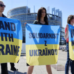 
              Climate activists claiming the war in Ukraine exposes the EU's dependence on Russian fossil gas, demonstrate outside the European Parliament , Tuesday, July 5, 2022 in Strasbourg, eastern France. (AP Photo/Jean-Francois Badias)
            
