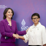 
              Indonesia's Foreign Minister Retno Marsudi, right, greets Germany's Foreign Minister Annalena Baerbock during the G20 Foreign Ministers' Meeting in Nusa Dua on the Indonesian resort island of Bali Friday, July 8, 2022. (Stefani Reynolds/Pool Photo via AP)
            