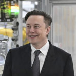 
              FILE - Tesla CEO Elon Musk attends the opening of the Tesla factory Berlin Brandenburg in Gruenheide, Germany, March 22, 2022. Twitter Inc.’s lawsuit to force billionaire Musk to make good on his promise to buy the social media giant will be resolved in a small but powerful Delaware court that specializes in high-stakes business disputes. (Patrick Pleul/Pool Photo via AP, File)
            