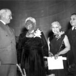 
              FILE - U.S. President Harry Truman, from left, poses with Mary McLeod Bethune, retiring founder-president of the National Council of Negro Women, Madame Vijaya Lakshmi Pandit, Ambassador of India to the United States, and Dr. Ralph Bunche, United Nations Director of Trusteeship, in Washington on Nov. 15, 1949. They were presented with citations for outstanding citizenship. Civil rights leader and trailblazing educator Mary McLeod Bethune has became the first Black person elevated by a state for recognition in the Capitol’s Statuary Hall. (AP Photo/Harvey Georges, File)
            