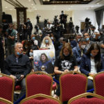 
              A photo of slain Palestinian-American journalist Shireen Abu Akleh is placed on a chair as journalists wait for remarks by U.S. President Joe Biden and Palestinian President Mahmoud Abbas following their meeting at the West Bank town of Bethlehem, Friday, July 15, 2022. (AP Photo/Evan Vucci)
            