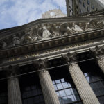 
              FILE - Sunlight shines on the facade of the New York Stock Exchange, Friday, July 8, 2022, in New York.  Wall Street is opening lower Tuesday, July 26, dragged down by weak profit reports from some of the biggest names in corporate America. The S&P 500 is down almost half a percent at the open and the Dow Jones Industrial Average is also falling slightly.   (AP Photo/John Minchillo, File)
            