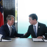 
              FILE - Georgia Gov. Bran Kemp, left, and Jaehoon "Jay" Chang, Hyundai Motor Company president and CEO, shake hands after signing an agreement to finalize a deal for Hyundai Motor Group to build a manufacturing plant in Ellabell, Ga., Friday, May 20, 2022. Georgia officials are close to finalizing a deal with the automaker to build a $5.5 billion electric car plant near Savannah, Ga. An economic development agency representing four Savannah-area counties approved its portions of the agreement Tuesday, July 19, 2022, including an economic incentives package. (Richard Burkhart/Savannah Morning News via AP, File)
            