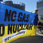 
              Climate activists claiming the war in Ukraine exposes the EU's dependence on Russian fossil gas, demonstrate outside the European Parliament , Tuesday, July 5, 2022 in Strasbourg, eastern France. (AP Photo/Jean-Francois Badias)
            