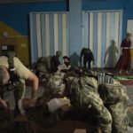 
              Medic volunteer Nataliia Voronkova, gives a medical tactical training session to paramedics and soldiers, in Dobropillia, eastern Ukraine, Friday, July 22, 2022.  Voronkova has dedicated her life to aid distribution and tactical medical training for soldiers and paramedics, working on front line of the Donetsk region since the war began in 2014.(AP Photo/Nariman El-Mofty)
            