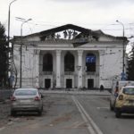 
              FILE - A view of the Mariupol theater damaged during fighting in Mariupol, in territory under the government of the Donetsk People's Republic, eastern Ukraine, Monday, April 4, 2022. Ministers from dozens of nations are meeting on Thursday, July 14, 2022 in the Netherlands to discuss with the International Criminal Court’s chief prosecutor how best to coordinate efforts to bring to justice perpetrators of war crimes in Ukraine. (AP Photo/Alexei Alexandrov, File)
            