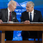 
              U.S. President Joe Biden and Israeli Prime Minister Yair Lapid sign a joint declaration affirming the "unbreakable bonds" between the two countries and a U.S. commitment to protecting Israeli security, in Jerusalem, Thursday, July 14, 2022. (AP Photo/Evan Vucci)
            