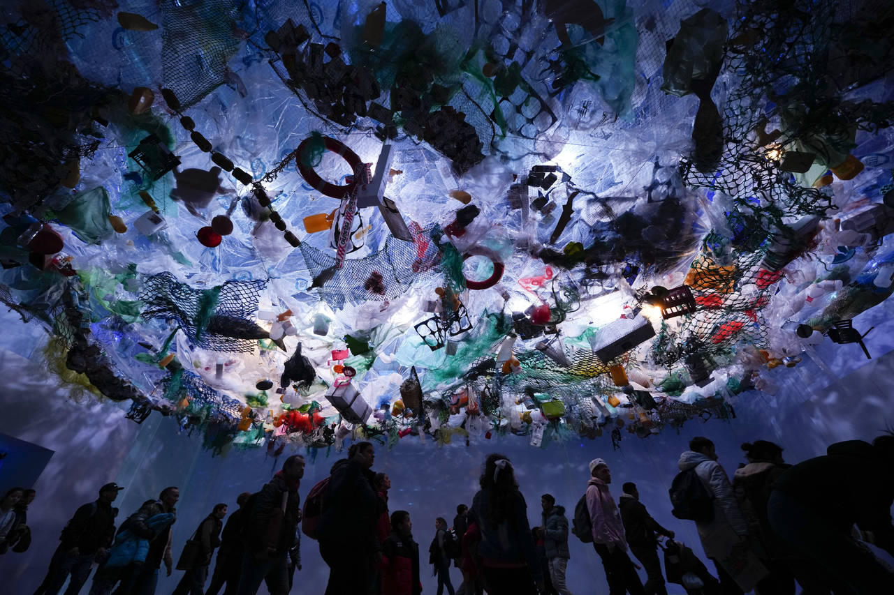 People walk in an exhibit simulating sea pollution during the 11th edition of Technopolis science, ...