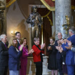
              Kansas Governor Laura Kelly, center, is joined by Speaker Nancy Pelosi, D-Calif., center left, Senate Minority Leader Mitch McConnell, R-Ky., far left, former Kansas Sen. Jerry Moran, center right, for the dedication and unveiling ceremony of a statue of in honor of Amelia Earhart, one of the world's most celebrated aviators and the first woman to fly solo across the Atlantic Ocean, in Statuary Hall, at the Capitol in Washington, Wednesday, July 27, 2022. The statue of Amelia Earhart will represent the State of Kansas in the National Statuary Hall Collection. (AP Photo/J. Scott Applewhite)
            
