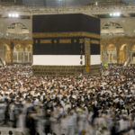 
              In this photo taken with low shutter speed, Muslim pilgrims circumambulate around the Kaaba, the cubic building at the Grand Mosque, in Mecca, Saudi Arabia, Wednesday, July 6, 2022. Muslim pilgrims are converging on Saudi Arabia's holy city of Mecca for the largest hajj since the coronavirus pandemic severely curtailed access to one of Islam's five pillars. (AP Photo/Amr Nabil)
            