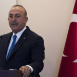 
              Turkish Foreign Minister Mevlut Cavusoglu, gives a speech during a press conference with German Foreign Minister Annalena Baerbock, in Istanbul, Friday, July 29, 2022. Germany's foreign minister has criticized Turkey for disputing the sovereignty of Greek islands near its coastline. She has also urged Greece to make sure that it complies with European Union values and stamps out any illegal pushbacks of migrants at the border. (AP Photo/Khalil Hamra)
            