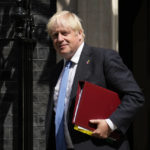 
              British Prime Minister Boris Johnson leaves 10 Downing Street, in London, to attend the weekly Prime Minister's Questions at the Houses of Parliament, Wednesday, July 20, 2022. The fractious race to replace Boris Johnson as Britain's prime minister entered an unpredictable endgame Tuesday as three candidates for Conservative Party leader were left battling for the two spots in a run-off vote. (AP Photo/Matt Dunham)
            