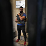 
              A Lebanese State Security officer stands guard at the entrance of the Central Bank in a raid, while Judge Ghana Aoun pursues embattled Central Bank Governor Riad Salameh charged for embezzlement and illicit inrichment in Beirut, Lebanon, Tuesday, July 19, 2022. (AP Photo/Bilal Hussein)
            