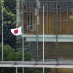 
              Japan's flag is flown at half mast at the prime minister's office in Tokyo, Japan, Monday, July 11, 2022, as former Prime Minister Shinzo Abe was assassinated Friday while campaigning in Nara, western Japan.(Kyodo News via AP)
            