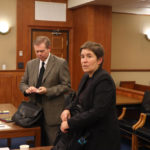 
              Attorneys Curtis Capehart, left, deputy attorney general for the West Virginia Attorney General's Office, and Kathleen Hartnett, of Cooley Law, representing West Virginia's only abortion clinic, prepare to leave the courtroom after a hearing over West Virginia's 1800s-era abortion ban in Kanawha County Circuit Court in Charleston, W.Va., Monday, July 18, 2022. (AP Photo/Leah Willingham)
            